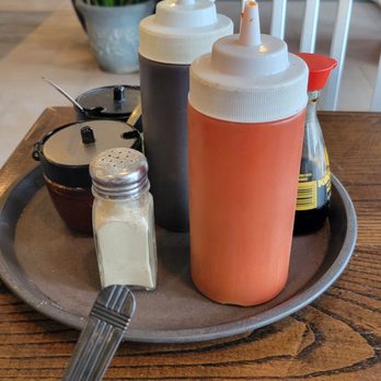 Noodle 21 - Condiments: Sriracha Hot Sauce....Hoisin Sauce....Hot Chili Sauce....Pickled Jalapeños....Soy Sauce....Salt and Pepper....Yum.... - Noodles Near Me - San Pablo, California
