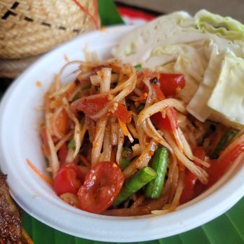 Yum Salut - a plate of food on a banana leaf - Laotian Near Me - Los Angeles, California Yum Salut - a plate of food on a banana leaf - Laotian Near Me - Los Angeles, California