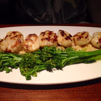 Seasons 52 - Caramelized Grilled Sea Scallops butternut squash risotto, broccolini, lemon butter - New American Near Me - Memphis, Tennessee Seasons 52 - Caramelized Grilled Sea Scallops butternut squash risotto, broccolini, lemon butter - New American Near Me - Memphis, Tennessee