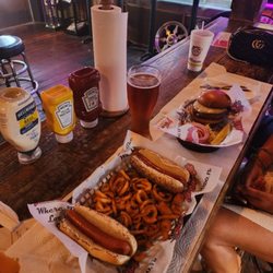 Johnny's Fillin' Station - Cheeseburger ($10.65) and Hot dog basket with fries ($11) and Yuengling 20 oz ($4.65).