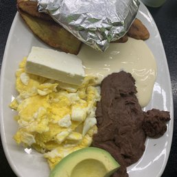 Traditional Salvadorean Breakfast- Sweet Fried Plantains, Scrambled eggs, refried beans, fresh cheese, avocado and Tortillas Traditional Salvadorean Breakfast- Sweet Fried Plantains, Scrambled eggs, refried beans, fresh cheese, avocado and Tortillas