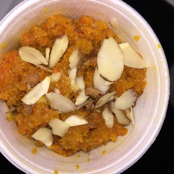 Taj Cuisine Indian Pak food - Gajar Halwa - SO good! It's grated carrots made into a thick pudding and has lots of cardamom. - Indian Near Me - Garden City, Michigan Taj Cuisine Indian Pak food - Gajar Halwa - SO good! It's grated carrots made into a thick pudding and has lots of cardamom. - Indian Near Me - Garden City, Michigan
