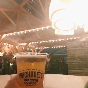 Boston Seasons - beautiful outdoor patio with beer on tap, cozy seating and dim lighting - Beer Gardens Near Me - Boston, Massachusetts