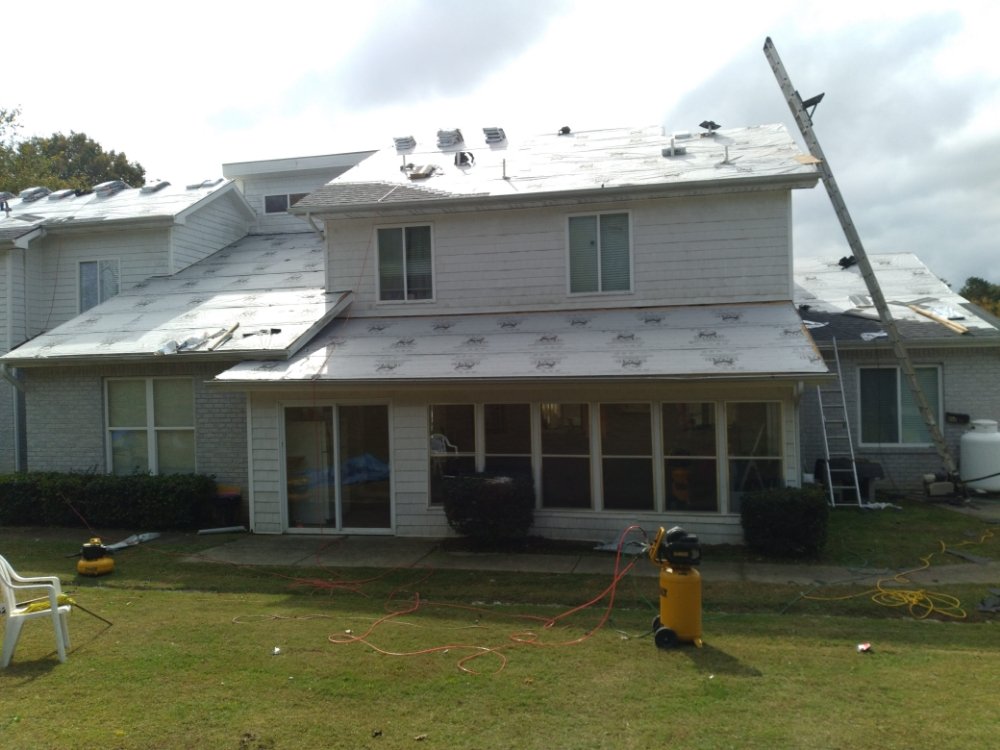 Slide of JR Dalton Roofing Services