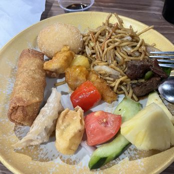 Golden Chopsticks Buffet - Pineapple, cucumber/tomato salad, crab rangoon, fried dumpling (gyoza), fried egg roll, pineapple chicken, beef and peppers, lo mein, donut - Buffets Near Me - Palm Coast, Florida Golden Chopsticks Buffet - Pineapple, cucumber/tomato salad, crab rangoon, fried dumpling (gyoza), fried egg roll, pineapple chicken, beef and peppers, lo mein, donut - Buffets Near Me - Palm Coast, Florida