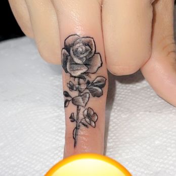 Uptown Tattoo - Rose tatt on middle finger - Tattoo Near Me - Whittier, California Uptown Tattoo - Rose tatt on middle finger - Tattoo Near Me - Whittier, California