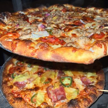 Tiny Champions - Pineapple pizza and fennel sausage pizza - Pizza Near Me - Houston, Texas