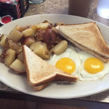 Mckay's - White toast with 2 sunny side up eggs and home fries - Breakfast & Brunch Near Me - Quincy, Massachusetts