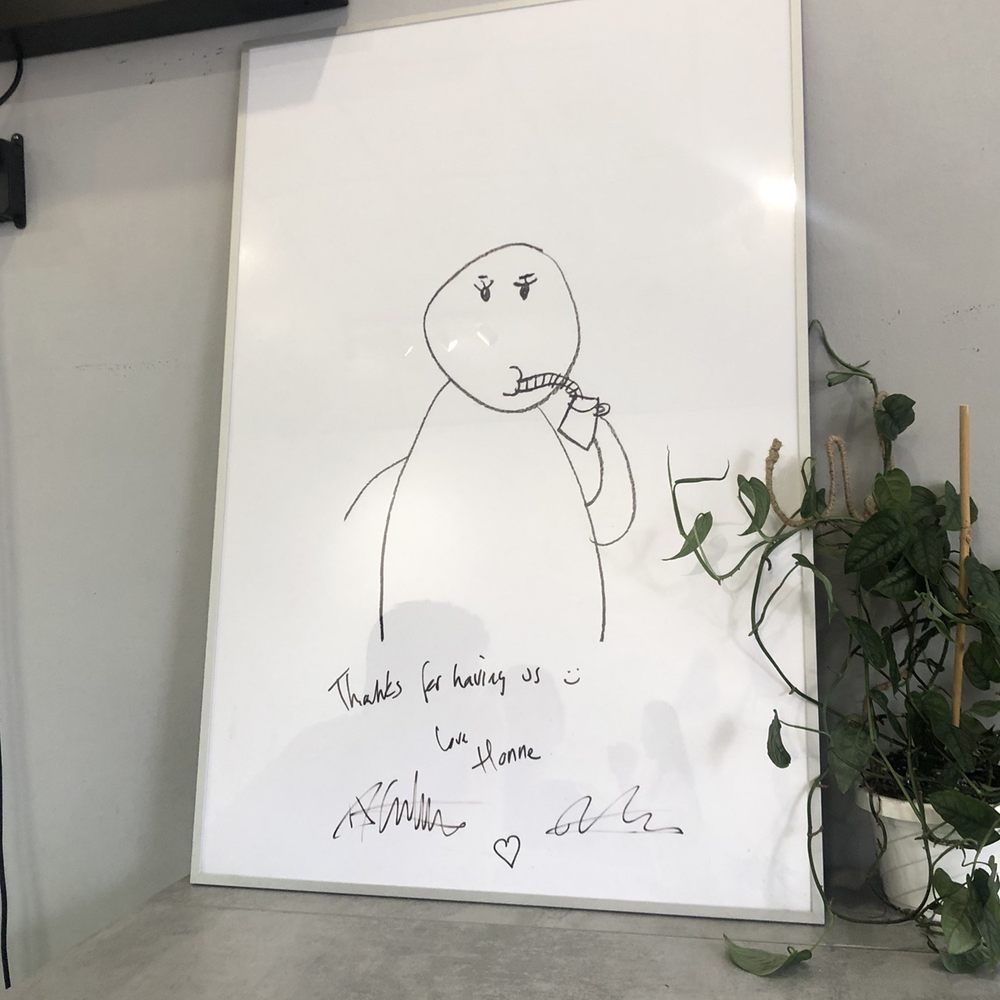 The Sipping Room by Breeze - Inside - A sign signed by Honne (singers) - Coffee & Tea Near Me - Boston, Massachusetts The Sipping Room by Breeze - Inside - A sign signed by Honne (singers) - Coffee & Tea Near Me - Boston, Massachusetts