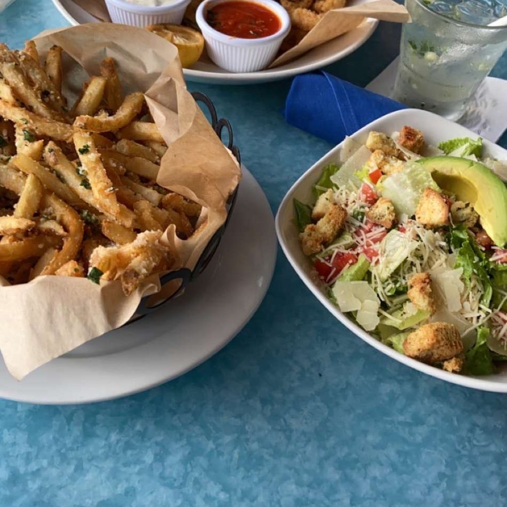 Deck 84 - Truffle fries Fried Calamari and zucchini Cesar salad - New American Near Me - Delray Beach, Florida Deck 84 - Truffle fries Fried Calamari and zucchini Cesar salad - New American Near Me - Delray Beach, Florida