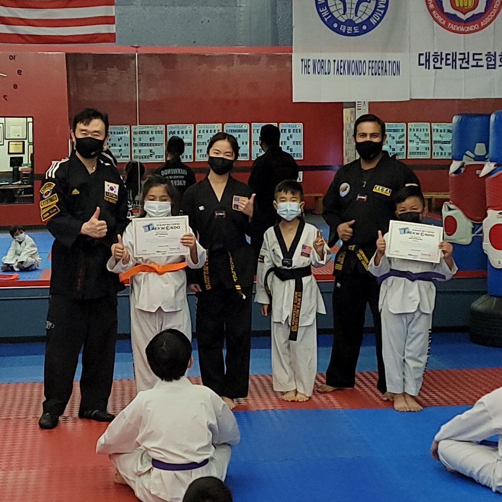 U.S Black Belt Center - Walnut - Presenting the kids with their certificate of achievement and new higher belt. Good job guys! - Taekwondo Near Me - Walnut, California U.S Black Belt Center - Walnut - Presenting the kids with their certificate of achievement and new higher belt. Good job guys! - Taekwondo Near Me - Walnut, California