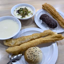 soy milk, youtiao, soft tofu, rice roll and pepper bun soy milk, youtiao, soft tofu, rice roll and pepper bun