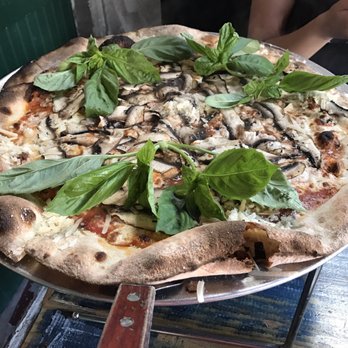 Lucali - 2. 24" pie with sliced portobello mushrooms, fresh garlic & fresh basil #Lucali #LucaliMiamiBeach - Italian Near Me - Miami Beach, Florida