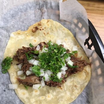 Red Salsa Tacos & More - Barbacoa taco in home made flour with onions and cilantro. Delicious! - Mexican Near Me - Spring, Texas Red Salsa Tacos & More - Barbacoa taco in home made flour with onions and cilantro. Delicious! - Mexican Near Me - Spring, Texas