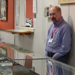 Showcases for jewelry and other small valuables, overseen by long-time employee, Richard