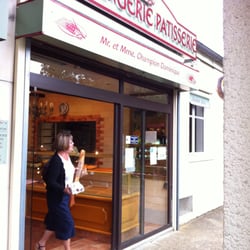 Champion Dominique - Open door welcoming storefront.
