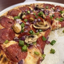 a half eaten pizza a half eaten pizza
