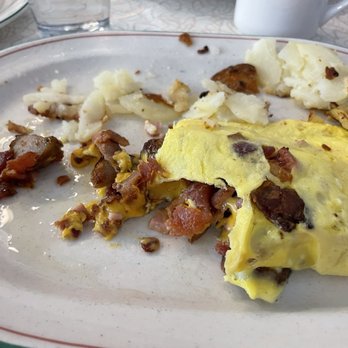 La Grange Breakfast Cafe - The egg is really thin but inside it is packed with meat and cheese. - Breakfast & Brunch Near Me - La Grange, Illinois