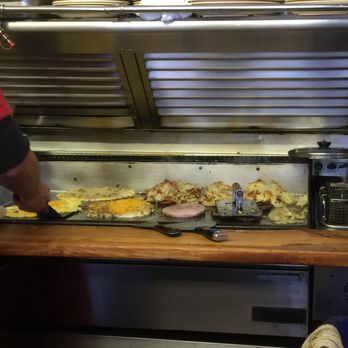 TNT's Snack Shop - There are some serious breakfasts cooking on the grill. - Diners Near Me - Arlington Heights, Illinois