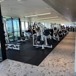 Equinox Pacific Palisades - Second floor free weights, cardio equipment, and large stretching area