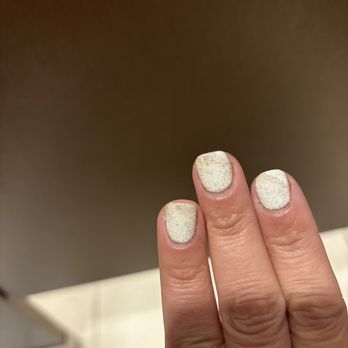 Simply Nail Bar -  Glendale - The chipped top coat and cracker discoloration on my gel manicure - Nail Salons Near Me - Glendale, California