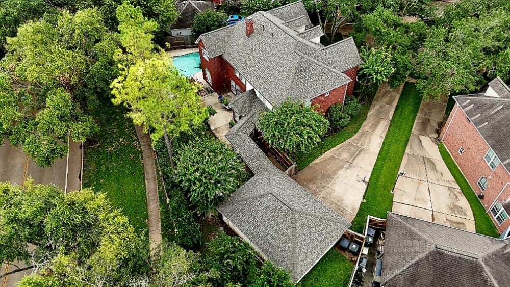 Slide of Bustamante Roofing and Construction