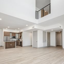 The 6800 - Spacious Living room with lofted level and high ceilings.