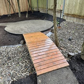 Tierra Dura Construction - a round patio with bridge - Landscaping Near Me Tierra Dura Construction - a round patio with bridge - Landscaping Near Me