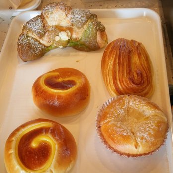 Sunmerry Bakery - Clockwise from top - green tea croissant, taro bun, cream cheese bun, and custard buns. All good including Nutella Bun ( not shown) - Coffee & Tea Near Me - Edison, New Jersey Sunmerry Bakery - Clockwise from top - green tea croissant, taro bun, cream cheese bun, and custard buns. All good including Nutella Bun ( not shown) - Coffee & Tea Near Me - Edison, New Jersey