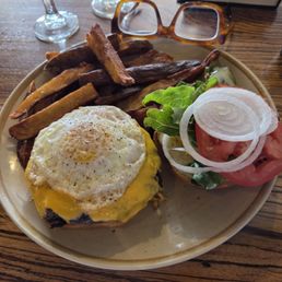 Burger with over easy eggs Burger with over easy eggs