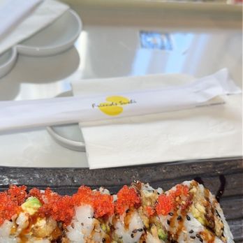 Friends Sushi Izakaya - Red Spider and Dragon Maki across the table. - Sushi Bars Near Me - Chicago, Illinois Friends Sushi Izakaya - Red Spider and Dragon Maki across the table. - Sushi Bars Near Me - Chicago, Illinois