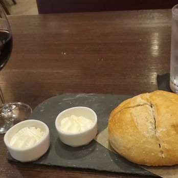 J Gilbert's - Glass of zin and bread with two butters: normal and pastrami - Bars Near Me - Omaha, Nebraska J Gilbert's - Glass of zin and bread with two butters: normal and pastrami - Bars Near Me - Omaha, Nebraska