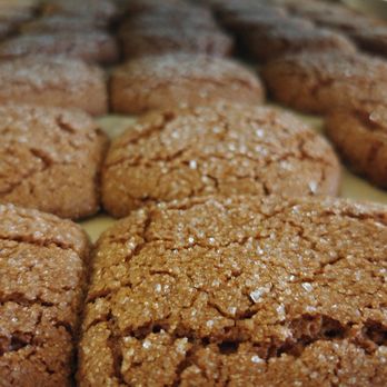 True Grain Bread - Tray of fresh Red Fife Ginger Cookies, rich with molasses and fresh ginger root. True Grain's most popular cookie. - Bakeries Near Me - Summerland, British Columbia True Grain Bread - Tray of fresh Red Fife Ginger Cookies, rich with molasses and fresh ginger root. True Grain's most popular cookie. - Bakeries Near Me - Summerland, British Columbia