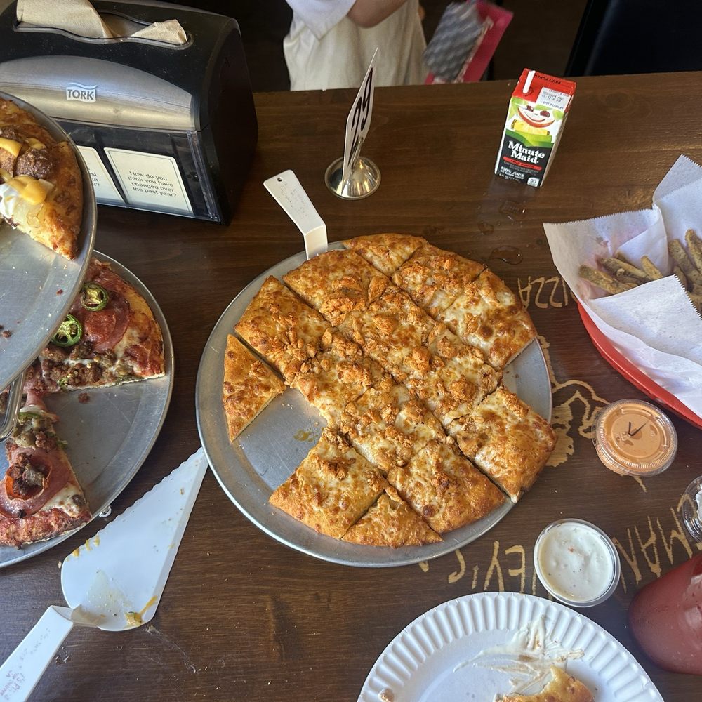 Caveman Cavey's Pizza - Baked potatoe (top) Buffalo chicken and meat lovers with jalapeños (bottom) - Pizza Near Me - Frazier Park, California Caveman Cavey's Pizza - Baked potatoe (top) Buffalo chicken and meat lovers with jalapeños (bottom) - Pizza Near Me - Frazier Park, California