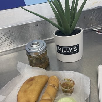 Milly's Empanada Factory - Chicken empanada and guava and cheese tequeno - Venezuelan Near Me - Miami, Florida Milly's Empanada Factory - Chicken empanada and guava and cheese tequeno - Venezuelan Near Me - Miami, Florida