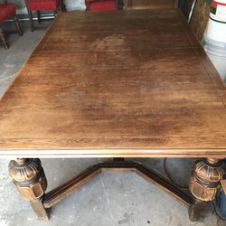 Dining room table before Chip restored it.