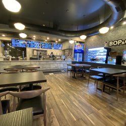 Bop & Gogi Korean Kitchen and Grill - Counter service. Clean and bright dining area. Various types of kimchi and other tasty snacks in the cooler.