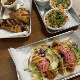 Burria tacos, gulf fish tacos, and chimichurri rice Burria tacos, gulf fish tacos, and chimichurri rice