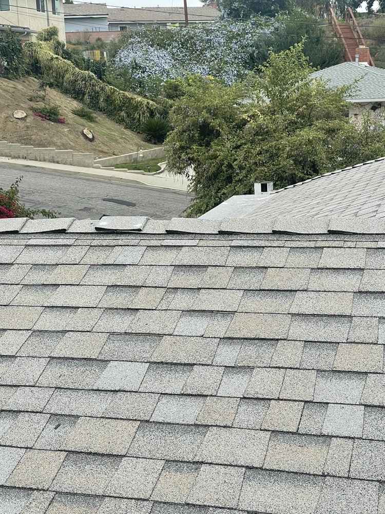 Slide of Rex Roofing