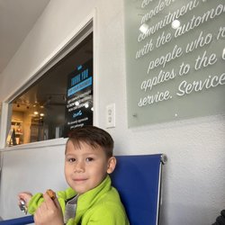 Beto's Auto Body & Paint - Collision Repair Center - Waiting comfortably in the office with this lil guy