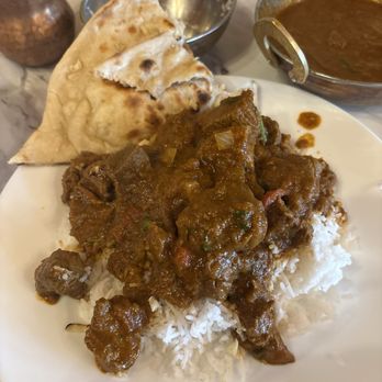 Saffron Indian Kitchen - Rogan Josh with Garlic Naan. - Indian Near Me - Montgomery, Alabama Saffron Indian Kitchen - Rogan Josh with Garlic Naan. - Indian Near Me - Montgomery, Alabama