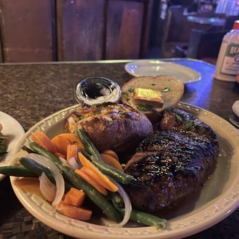 The Alley - Alley Special which is a 16oz sirloin steak with loaded potatoes, vegetables, garlic bread and a side salad. - Dive Bars Near Me - Oakland, California The Alley - Alley Special which is a 16oz sirloin steak with loaded potatoes, vegetables, garlic bread and a side salad. - Dive Bars Near Me - Oakland, California