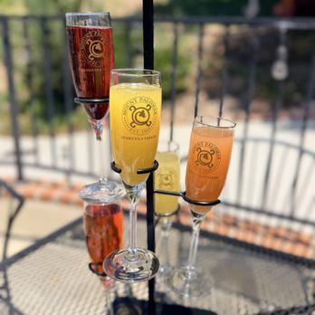 Bistro 1969 - Mimosa Tower (orange, cranberry, grapefruit, pineapple) - Bars Near Me - Temecula, California Bistro 1969 - Mimosa Tower (orange, cranberry, grapefruit, pineapple) - Bars Near Me - Temecula, California