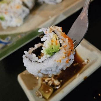 Wasabi's - A California Roll dipped in soy sauce. - Sushi Bars Near Me - Roanoke, Virginia Wasabi's - A California Roll dipped in soy sauce. - Sushi Bars Near Me - Roanoke, Virginia