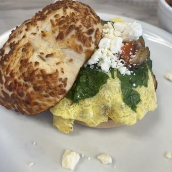 Java Bistro - Greek omelette feta cheese, spinach, mushrooms, tomatoes on a fluffy warm asiago cheese bagel. Delicious!!! - Juice Bars & Smoothies Near Me - Simpsonville, South Carolina