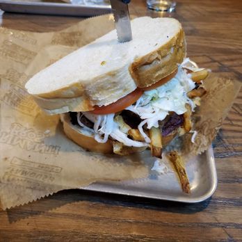 Primanti Bros. Restaurant and Bar - Pastrami with Fries, Coleslaw, and a fried egg tucked inside - Sandwiches Near Me - Cranberry, Pennsylvania Primanti Bros. Restaurant and Bar - Pastrami with Fries, Coleslaw, and a fried egg tucked inside - Sandwiches Near Me - Cranberry, Pennsylvania