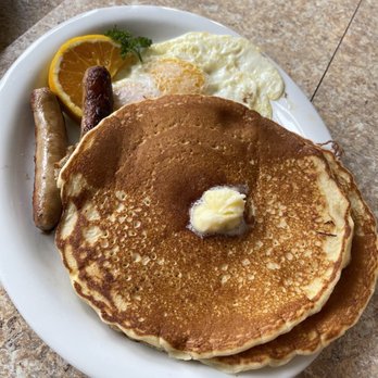 The Coffee Cup Cafe - Griddled and good combo with pancakes, sausage, and over easy eggs - American Near Me - Long Beach, California The Coffee Cup Cafe - Griddled and good combo with pancakes, sausage, and over easy eggs - American Near Me - Long Beach, California