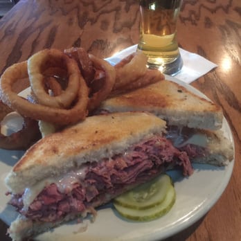 Egan's Pub - Corned beef and Swiss with onion rings. Pretty salty this time but usually it's excellent. - Irish Near Me - Belleville, Michigan