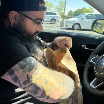 Bad-Ass Breakfast Burritos - my husband ripping the bag open lol 3 - Food Delivery Services Near Me - Centennial, Colorado
