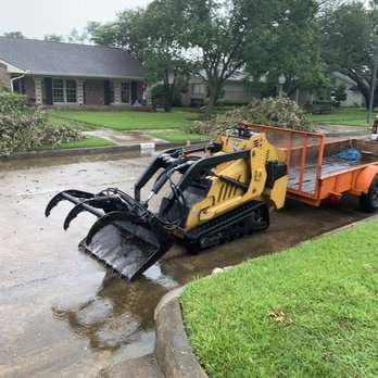 OM Tree Service - OM front end loader - Tree Services Near Me - Houston, Texas